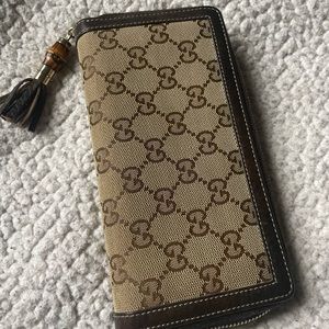 Authentic Gucci zip around brown leather trim,  bamboo wallet